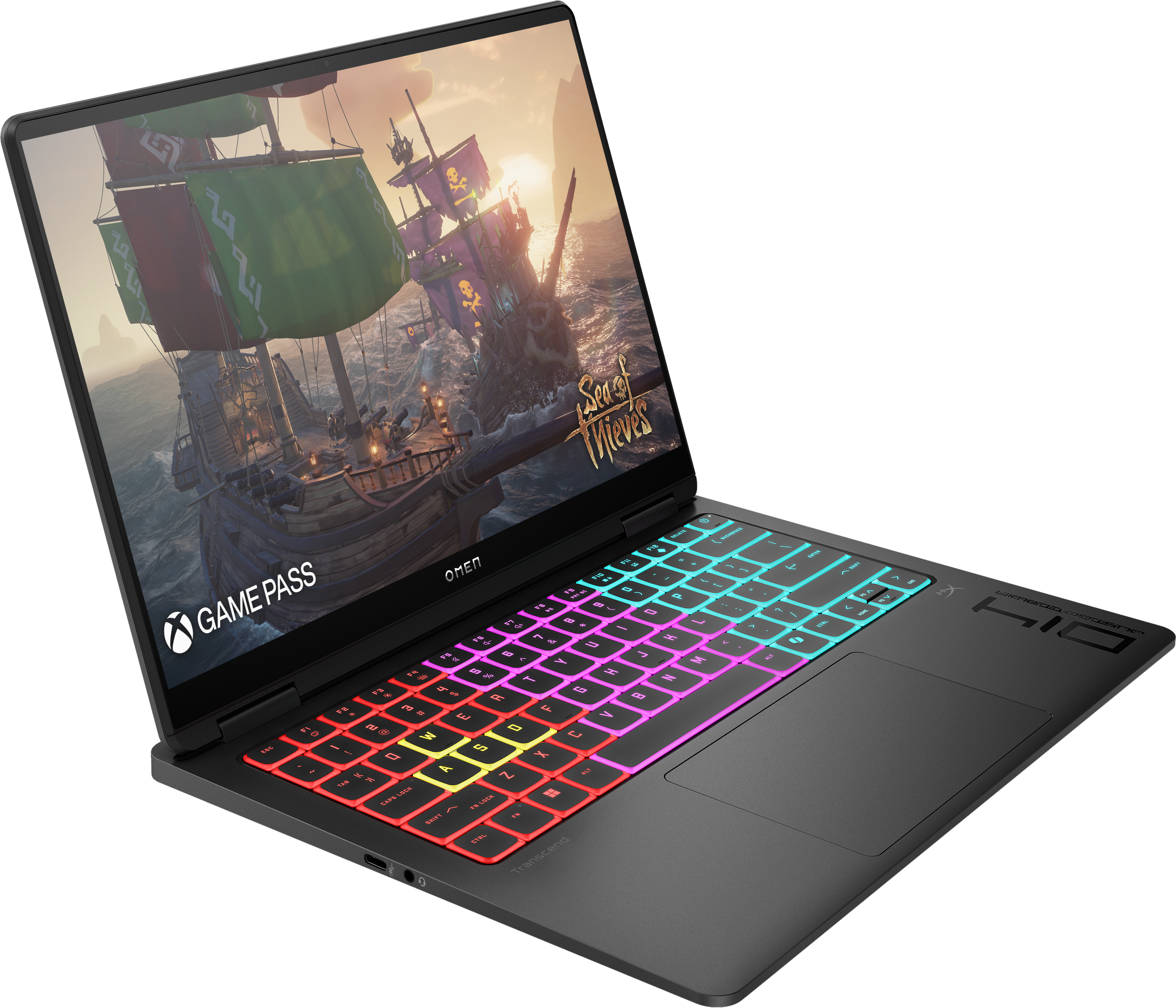 Ein Laptop zeigt eine Piratenschiff-Szene. Die Tastatur leuchtet in verschiedenen Farben. Game Pass Logo sichtbar.