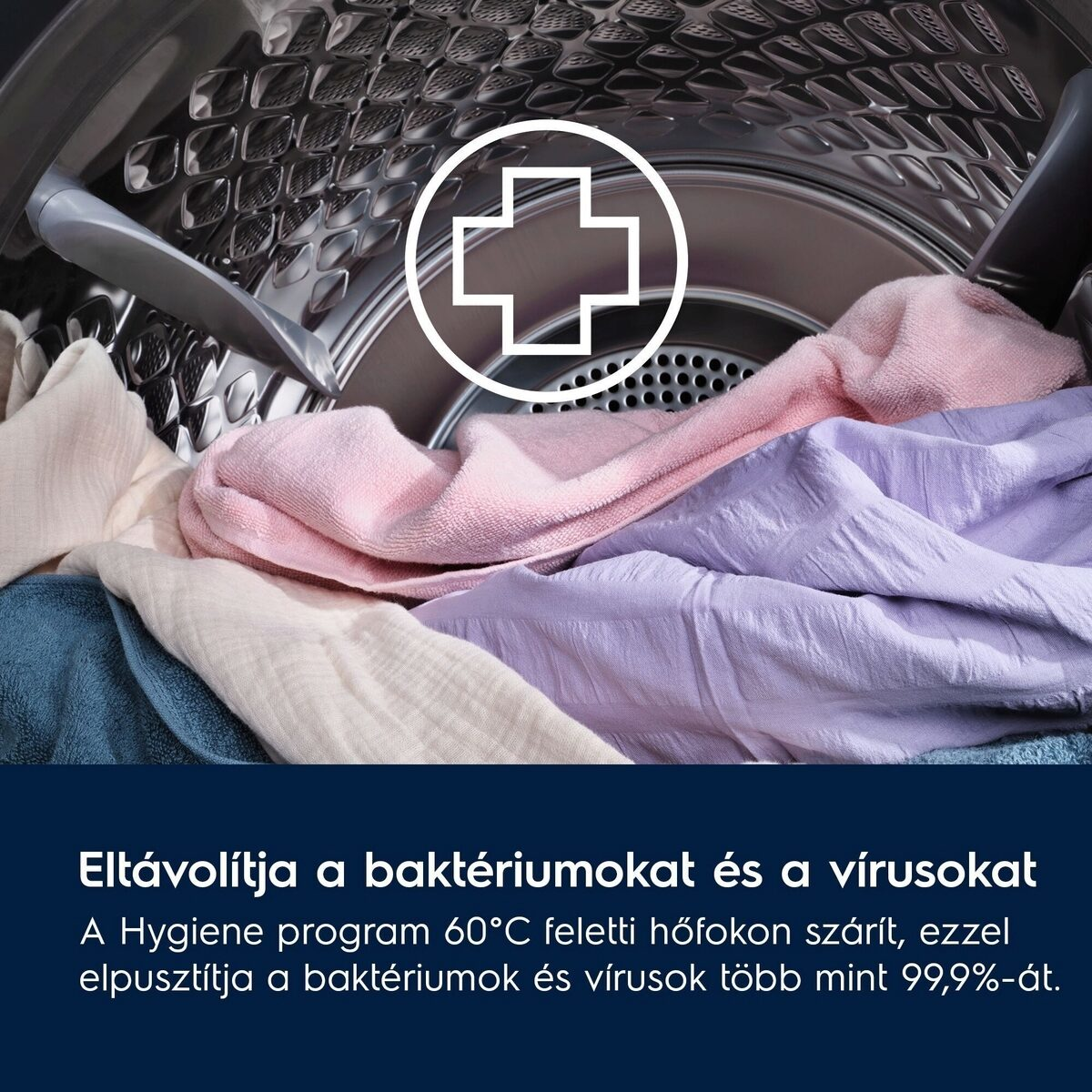 Egy mosógép belsejében színes ruhákkal. Fehér kereszt szimbólum felül. Alatta a szöveg: 'Eltávolítja a baktériumokat és vírusokat'.