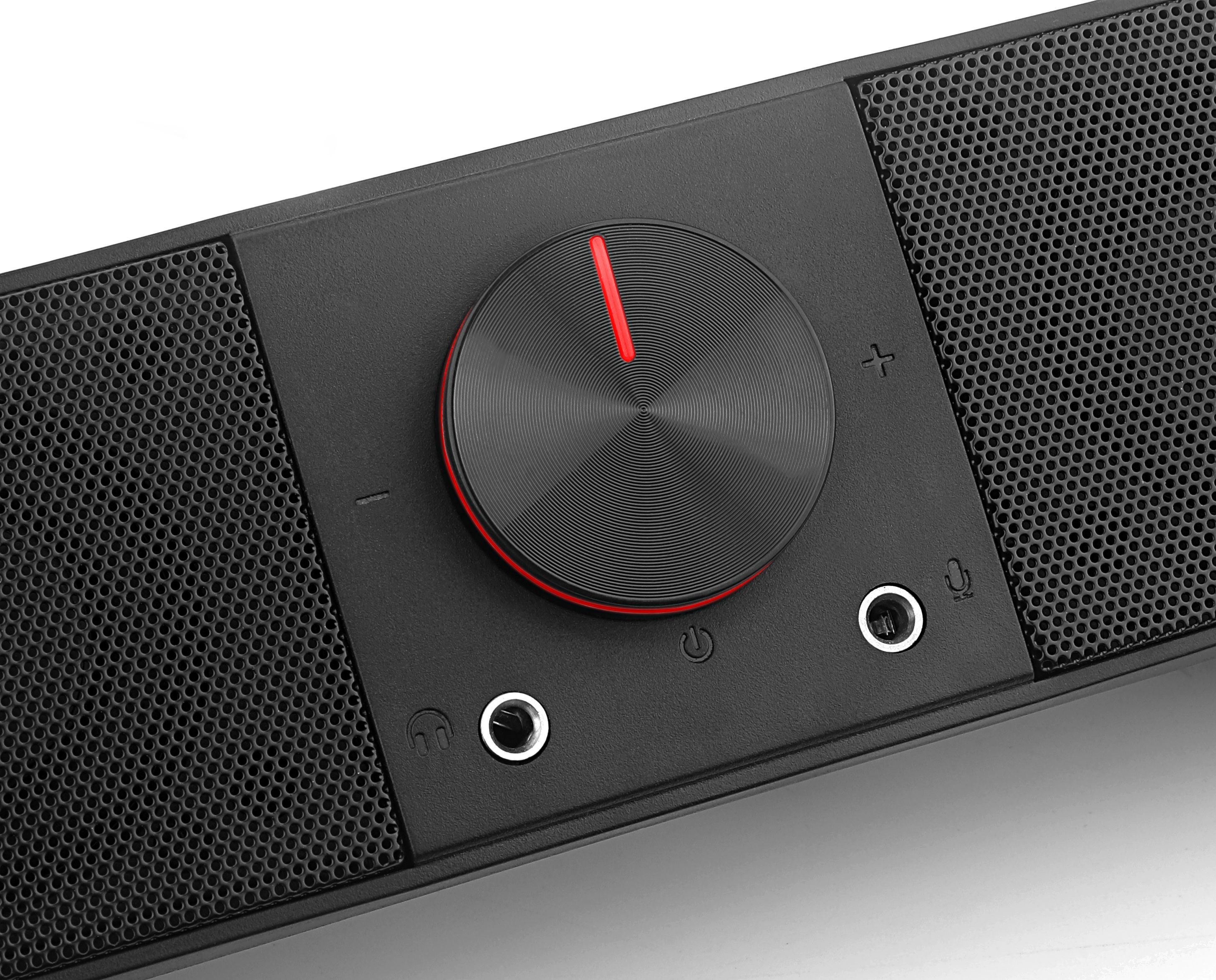 Czarny głośnik z pokrętłem głośności. Ma czerwoną linię na pokrętle i kilka gniazd wejściowych.