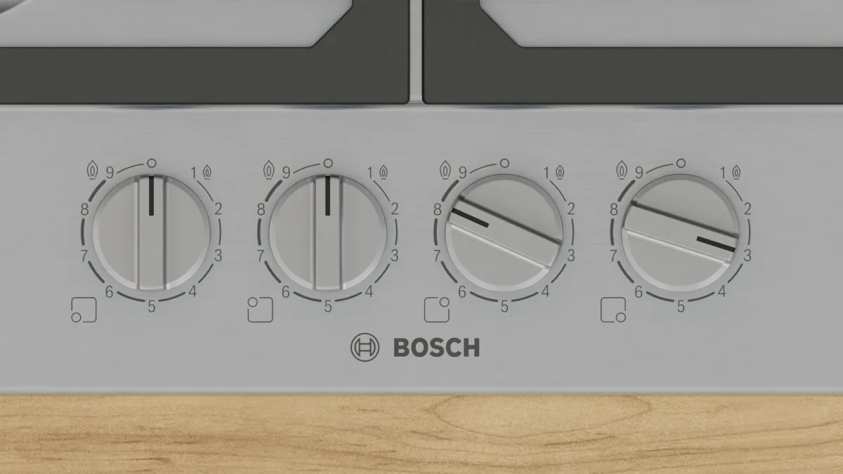 Bosch ocağının yakın çekimi. Rakamlarla dört kadran görünür. Kadranlar farklı seviyelerde ayarlanmıştır.