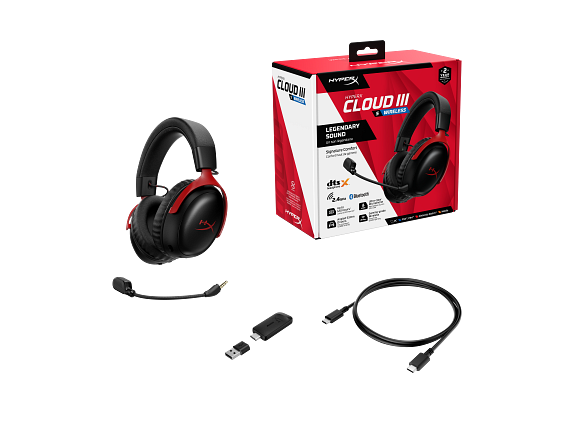 Siyah ve kırmızı HyperX Cloud III Wireless kulaklık, aksesuarlar ve kutu siyah zemin üzerinde.