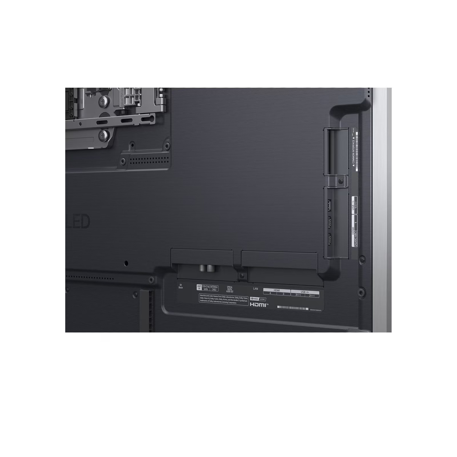 Arrière d'une télévision noire. Ports HDMI, USB, et LAN. Cadre argenté. Étiquette LED visible. Support de montage en haut.
