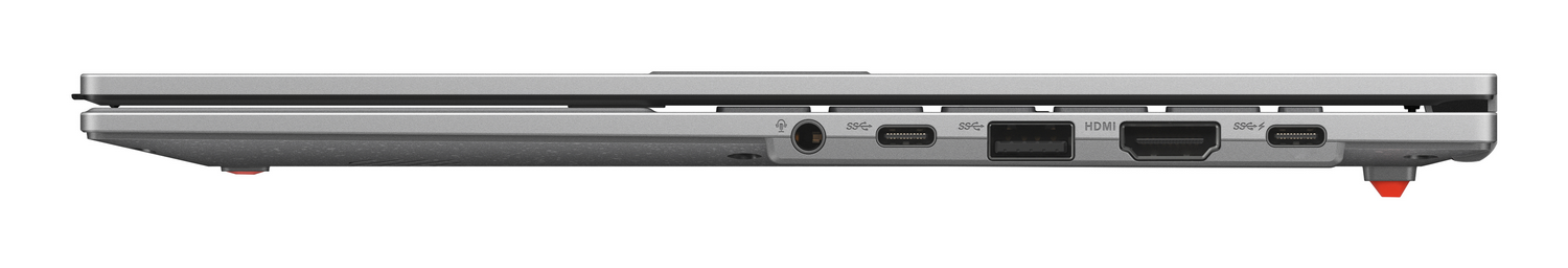 Vista lateral de una laptop plateada. Los puertos incluyen USB, HDMI y audio. Pies rojos en cada extremo. Bisagra negra y fondo blanco.