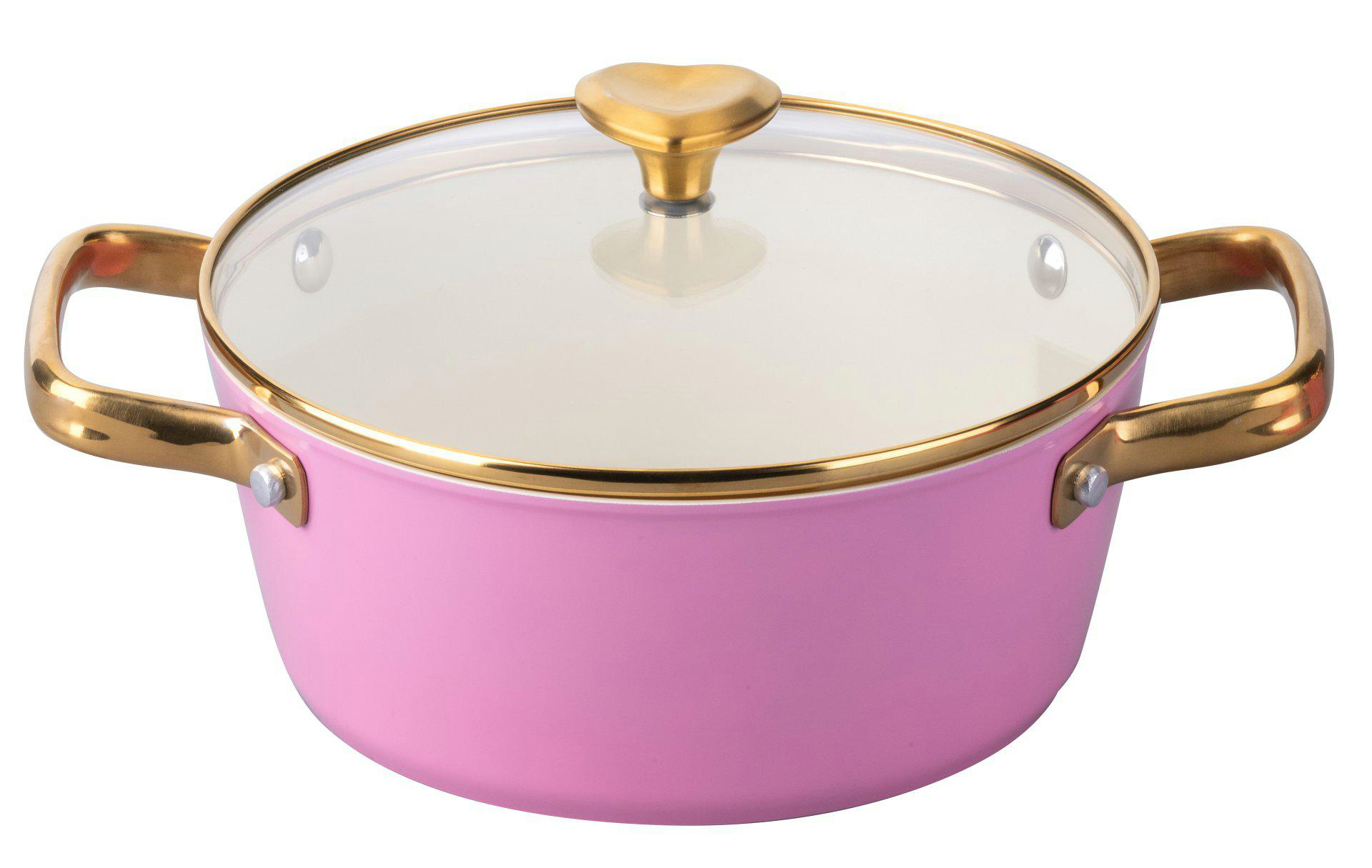 Ein rosa Kochtopf mit goldenen Griffen und Rand, einem Glasdeckel und einem herzförmigen Goldknopf.