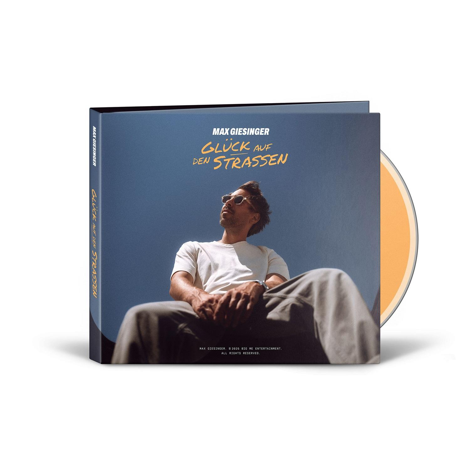 Albumcover. Mann mit Sonnenbrille blickt nach oben. Titel: Glück auf den Straßen. Hintergrund: Blauer Himmel. CD rechts.