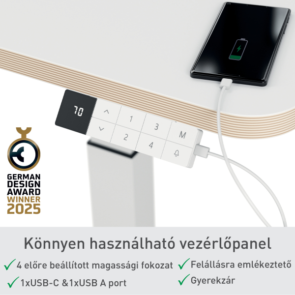 Fehér asztali vezérlőpanel gombokkal, German Design Award-dal és egy töltő telefonnal. A panelen a '70' látható.