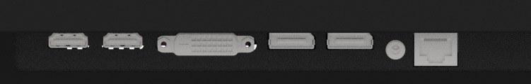 Nahaufnahme verschiedener Computeranschlüsse: zwei USB, DVI und Ethernet auf dunkler grauer Oberfläche. Anschlüsse sind silber.
