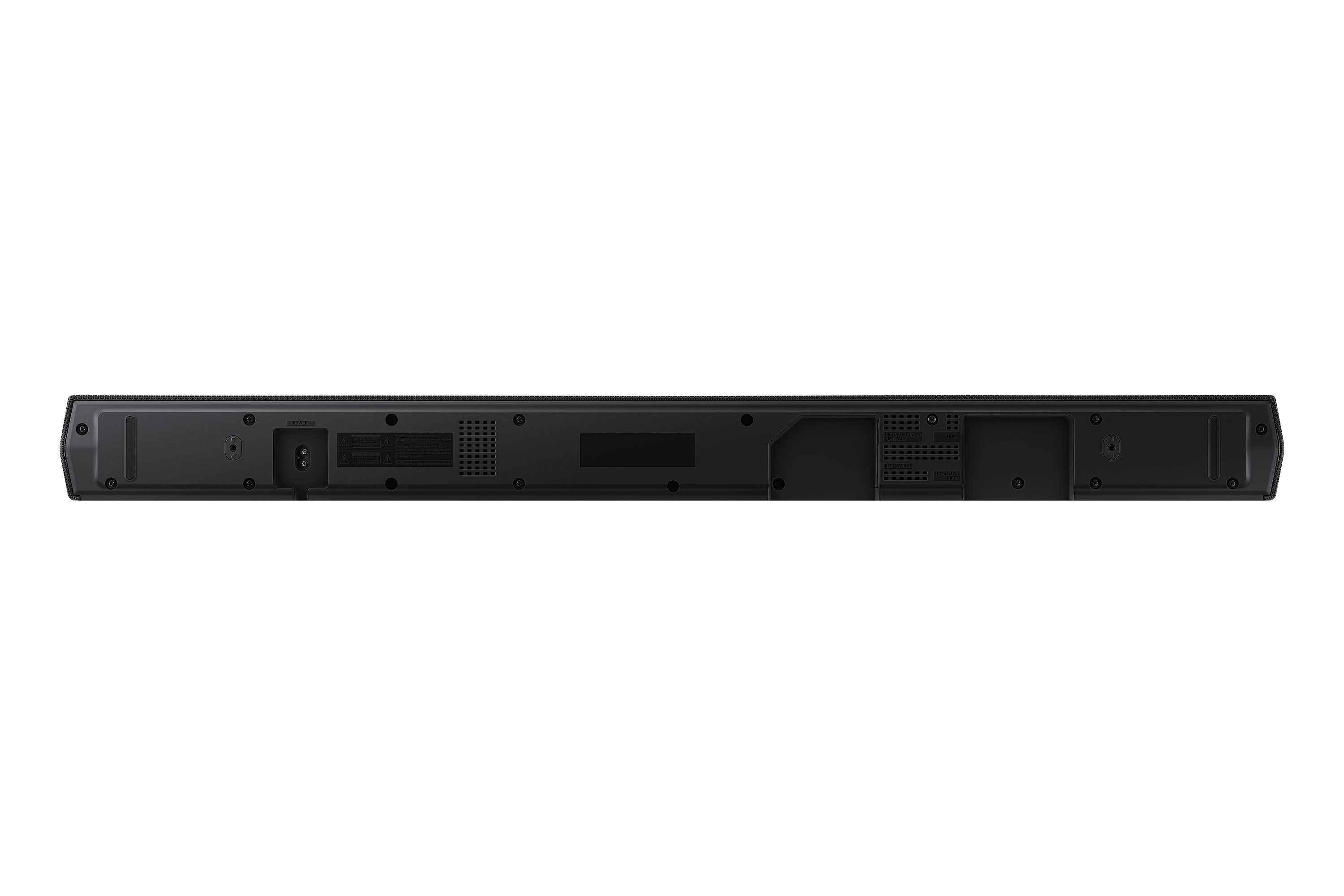 Siyah bir soundbar'ın arkası. Mat siyah yüzeyde bağlantı noktaları, etiketler ve vidalar var.