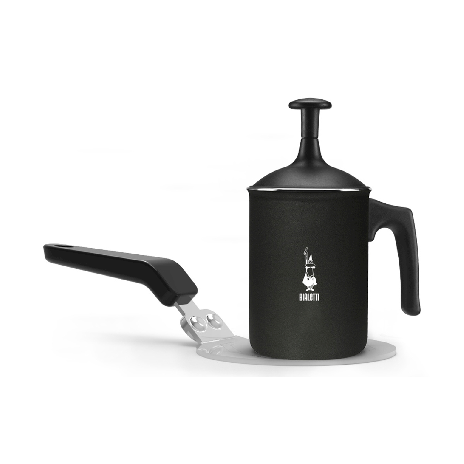 Una caffettiera Bialetti nera con manico staccato su una superficie bianca. Il manico è nero e metallico.