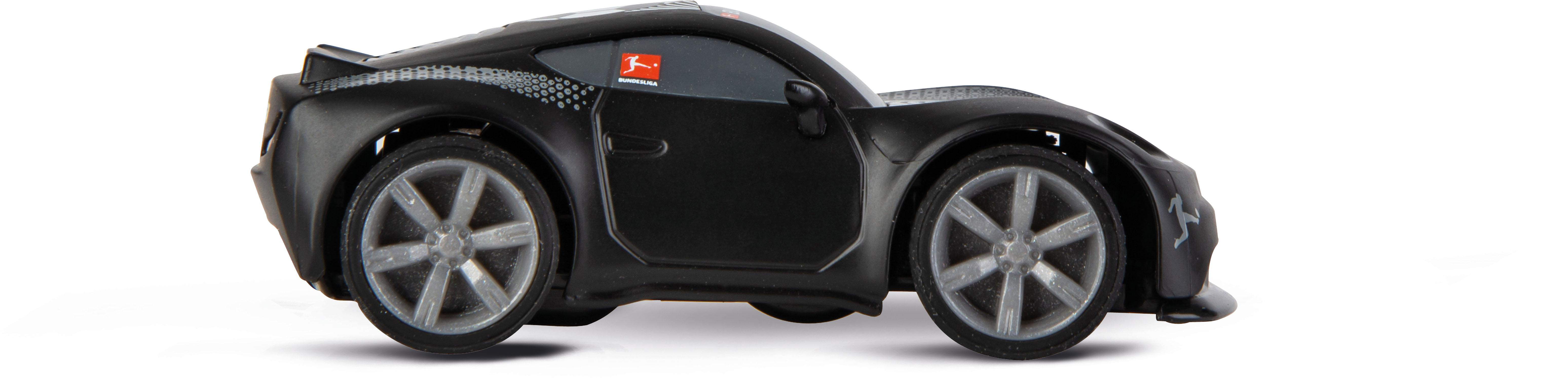 Ein schwarzes Spielzeugauto auf weißem Grund. Es hat silberne Räder und ein Bundesliga-Logo.