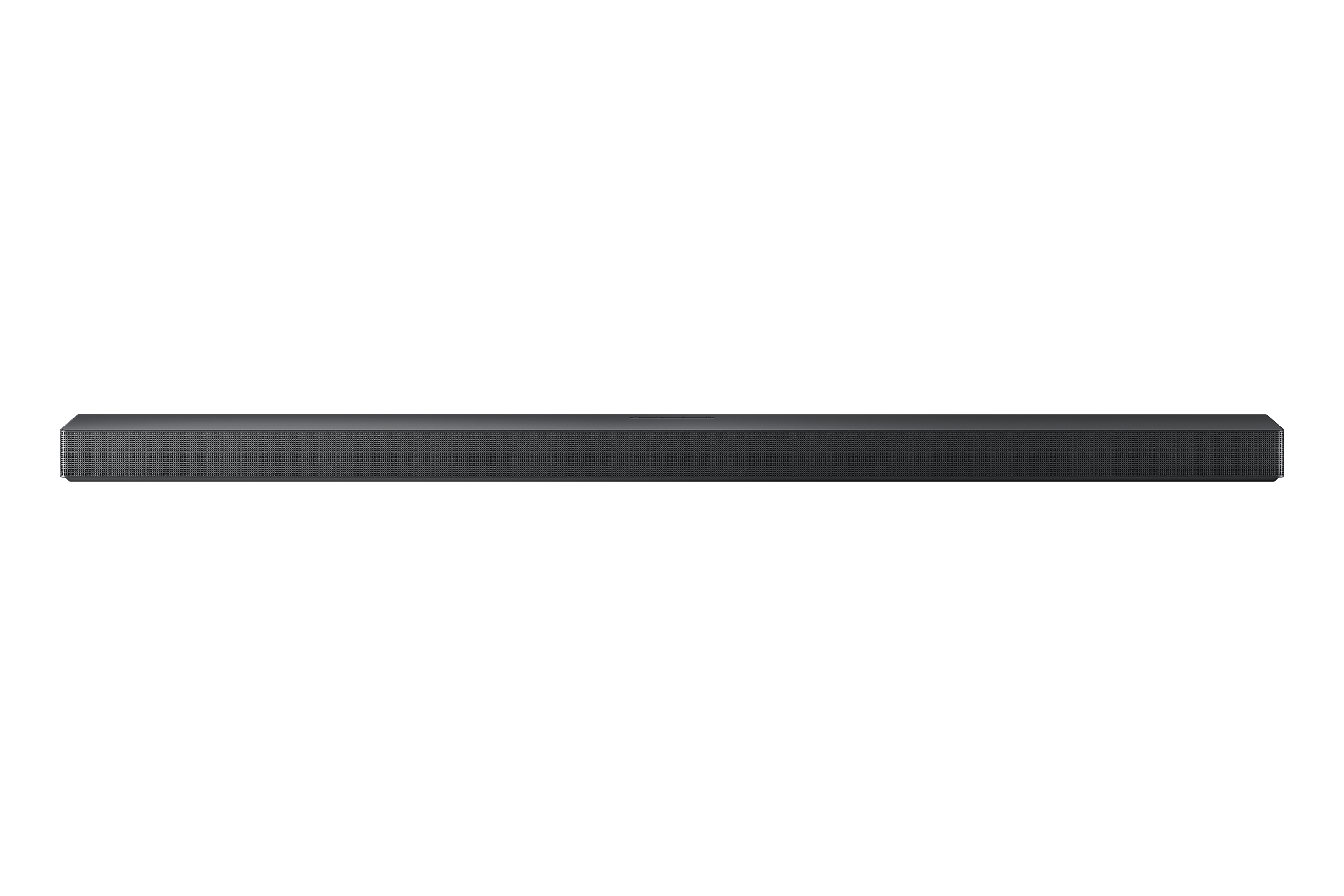 Siyah bir arka plan üzerinde ortalanmış koyu gri bir soundbar. Küçük delikleri olan uzun, dikdörtgen bir şekil.