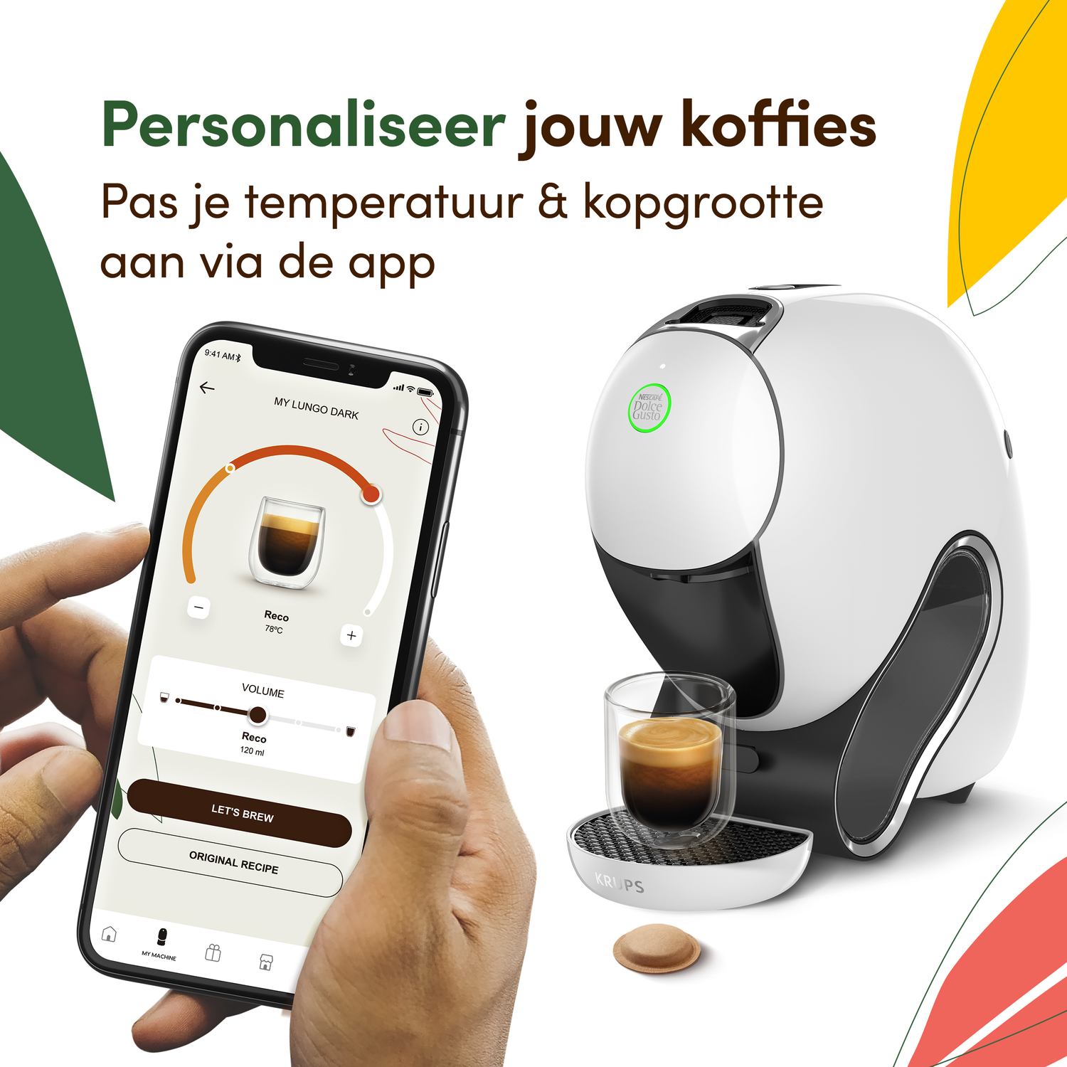 A person holding a phone with coffee machine controls. A coffee machine and a cup of coffee are also visible.