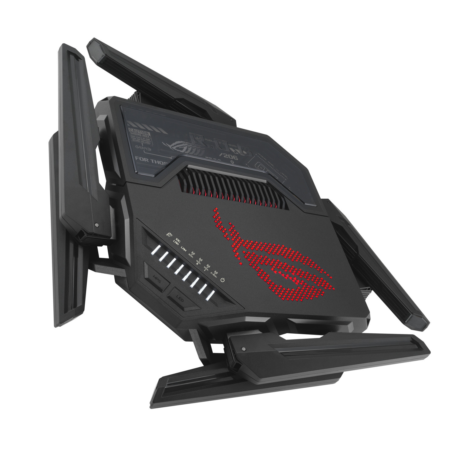Routeur noir et gris avec des touches de rouge, antennes et logo ROG. Dispose de plusieurs voyants. Le fond est blanc.