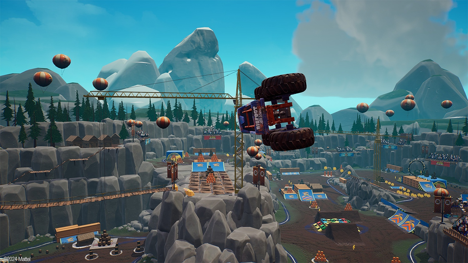 Ein Monstertruck, "Bigfoot", befindet sich in der Luft. Die Szene ist eine stilisierte Outdoor-Rennstrecke mit Ballons und Bergen im Hintergrund.