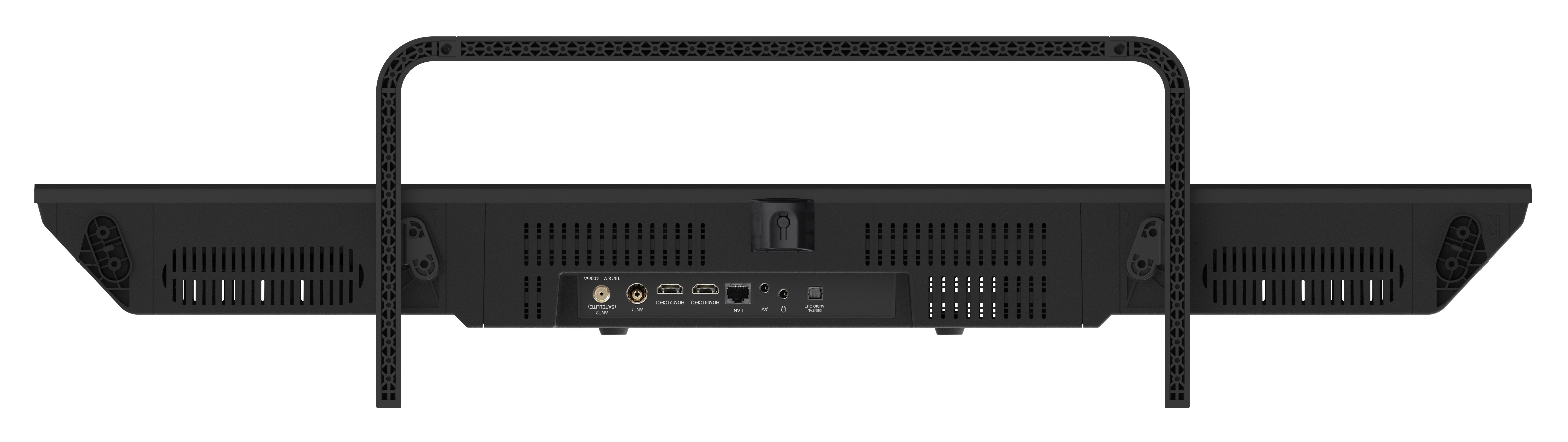Czarne urządzenie z uchwytem. Posiada porty dla satelity, HDMI, LAN i wyjścia audio. Białe tło.