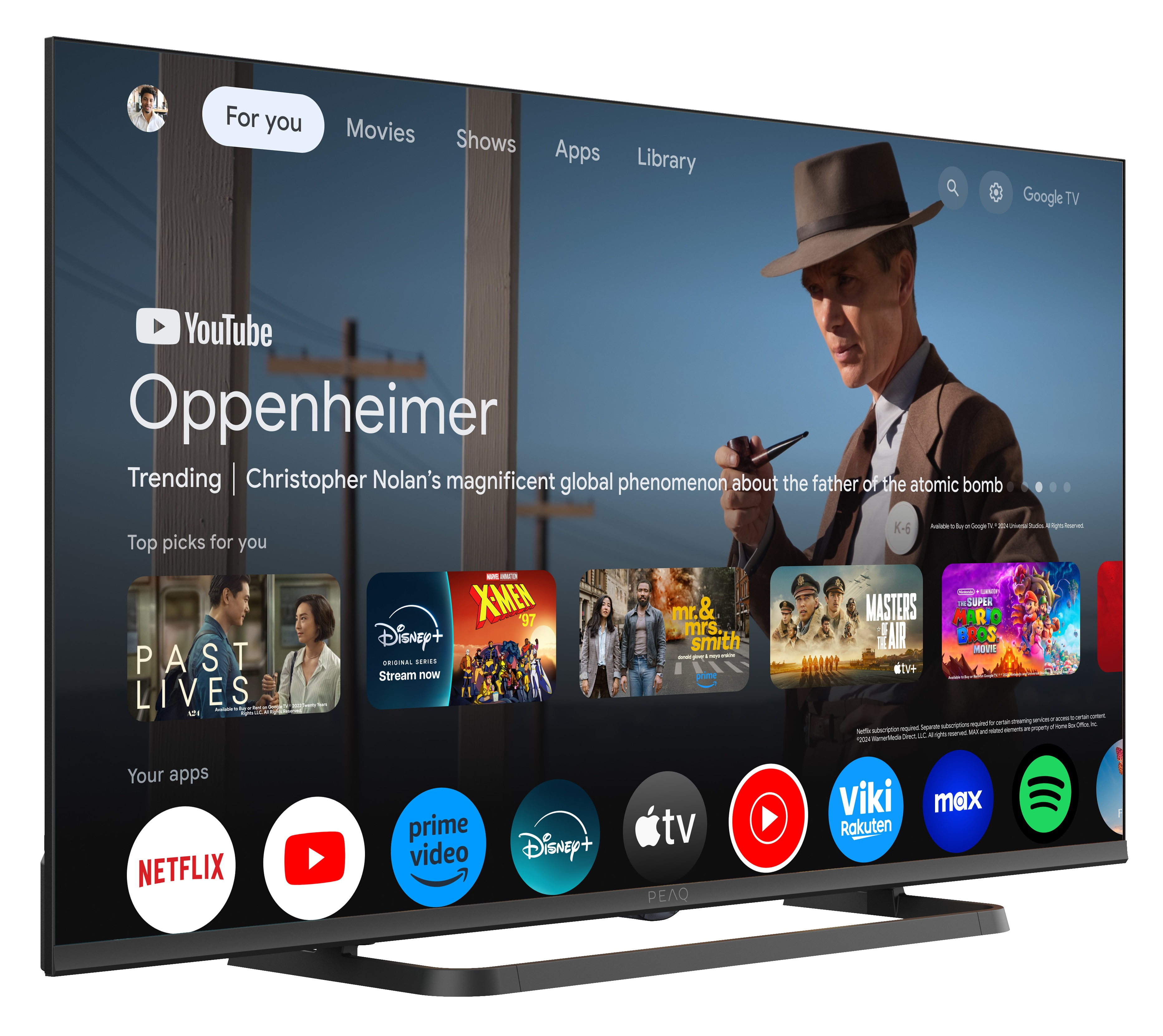 Telewizor wyświetla film Oppenheimer. Widoczne są aplikacje, takie jak Netflix, YouTube i Disney+.