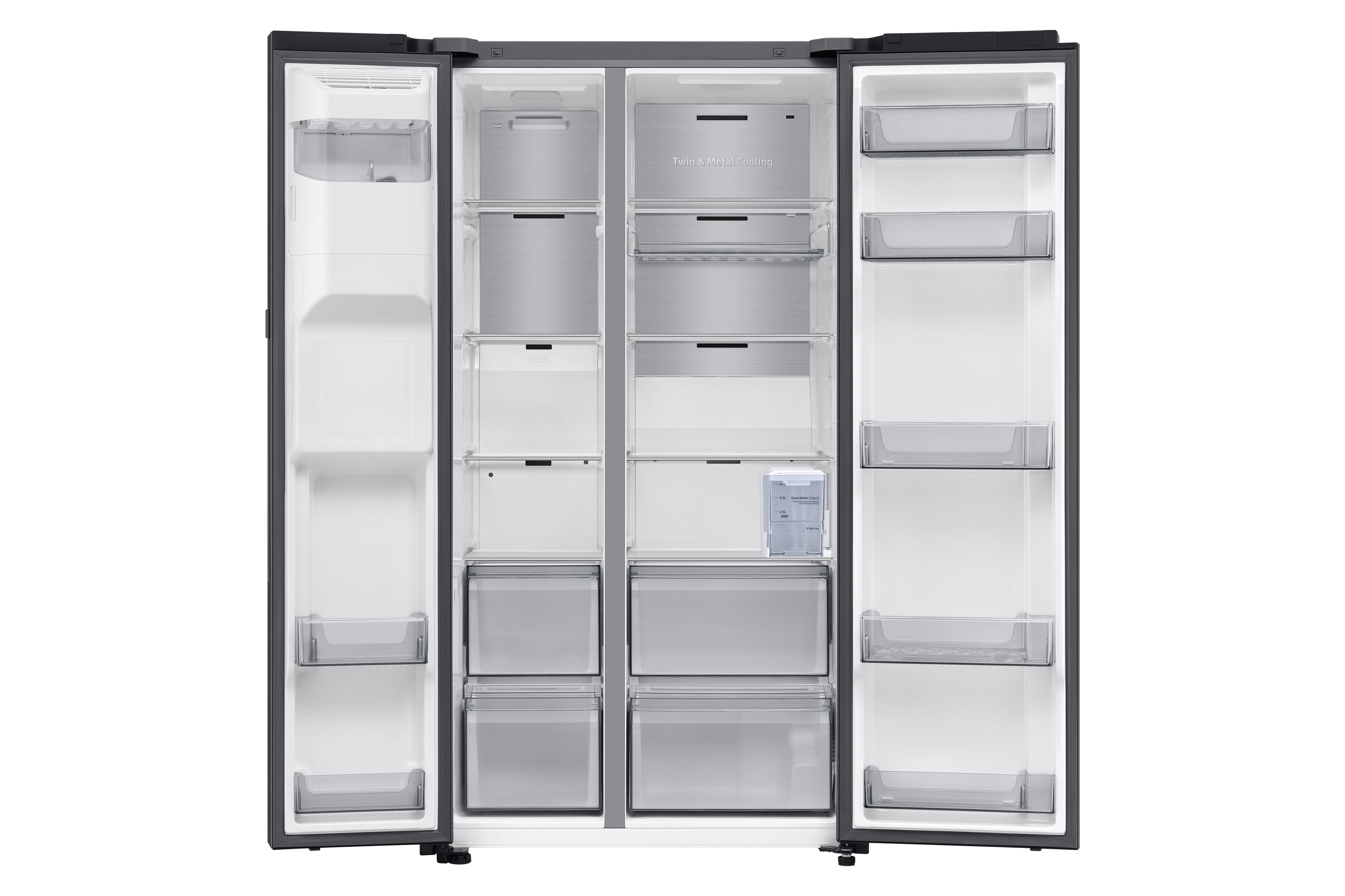 Geöffneter Kühlschrank mit grauem Äußeren. Innen sind Regale, Schubladen und Behälter sichtbar. Auf der Mitteltür steht Twin Metal Cooling.