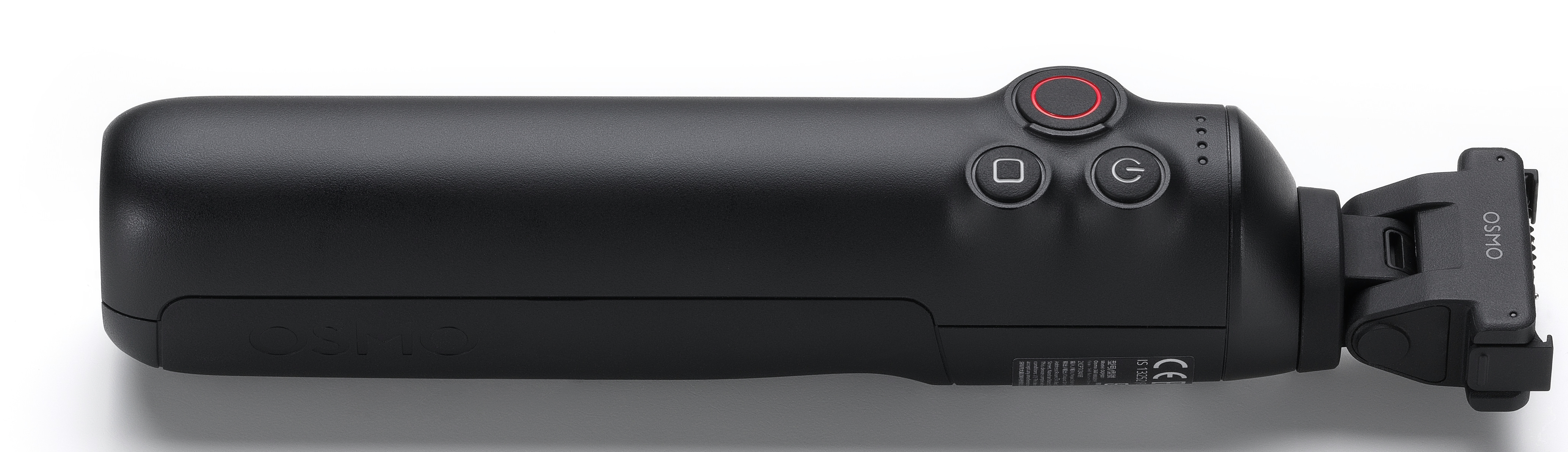 Czarna kamera Osmo. Ma kilka przycisków i czerwony przycisk na górze. Słowo Osmo jest widoczne.