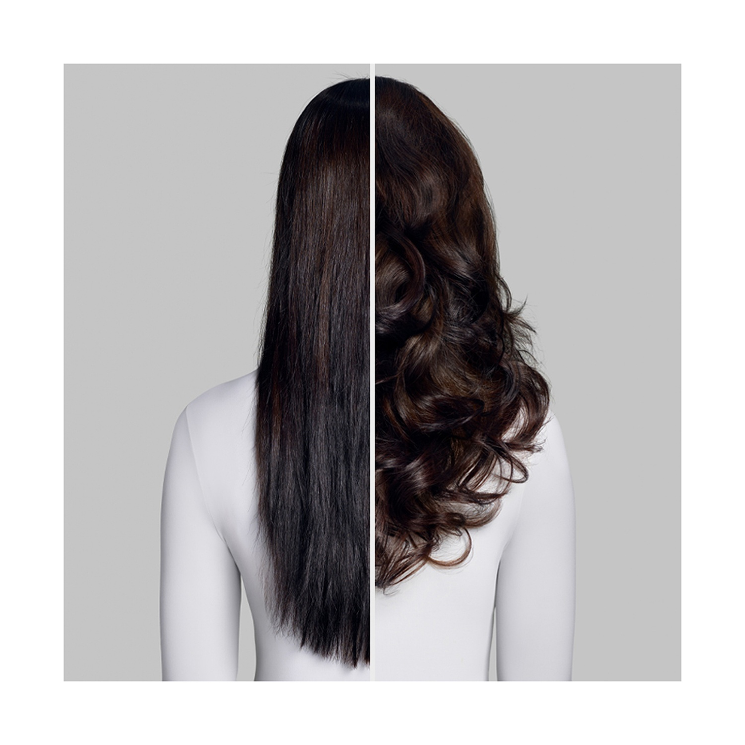 Una donna vista da dietro con due acconciature: capelli neri lisci a sinistra e capelli castani ricci a destra. Indossa una camicia bianca.