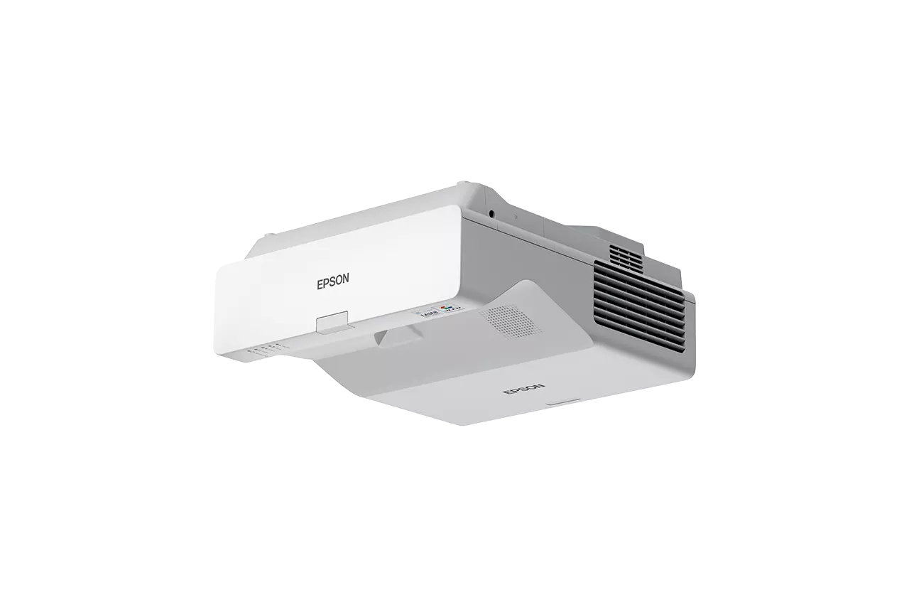 Fehér Epson projektor fekete háttéren. Az Epson logója látható. Oldal- és elülső nézet.