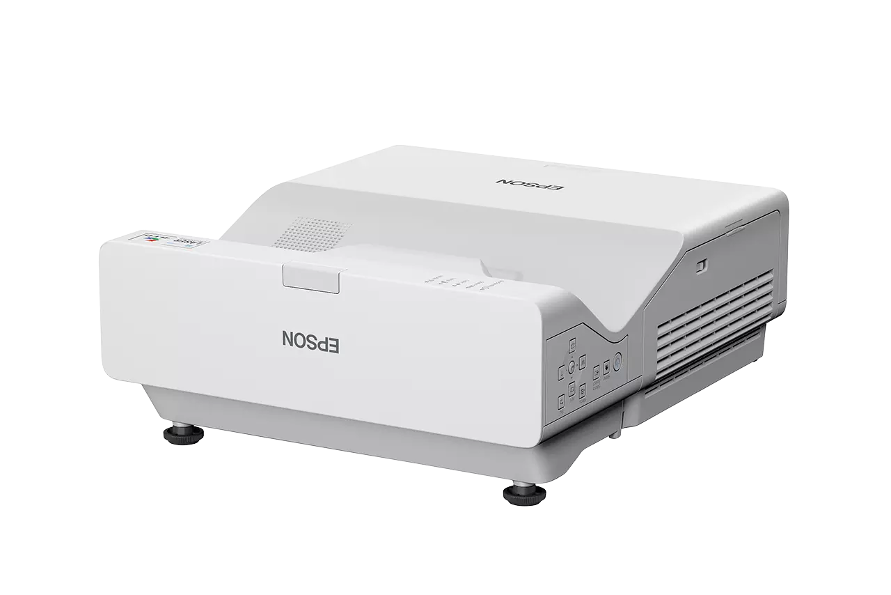 Egy fehér Epson projektor fekete háttérrel. A projektoron az Epson logó és vezérlőgombok láthatók.