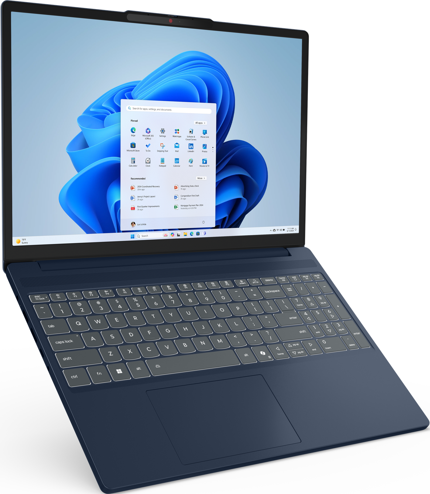 Ein blauer Laptop zeigt die Windows 11-Oberfläche. Die Tastatur ist sichtbar. Der Bildschirm zeigt App-Symbole und eine Suchleiste.