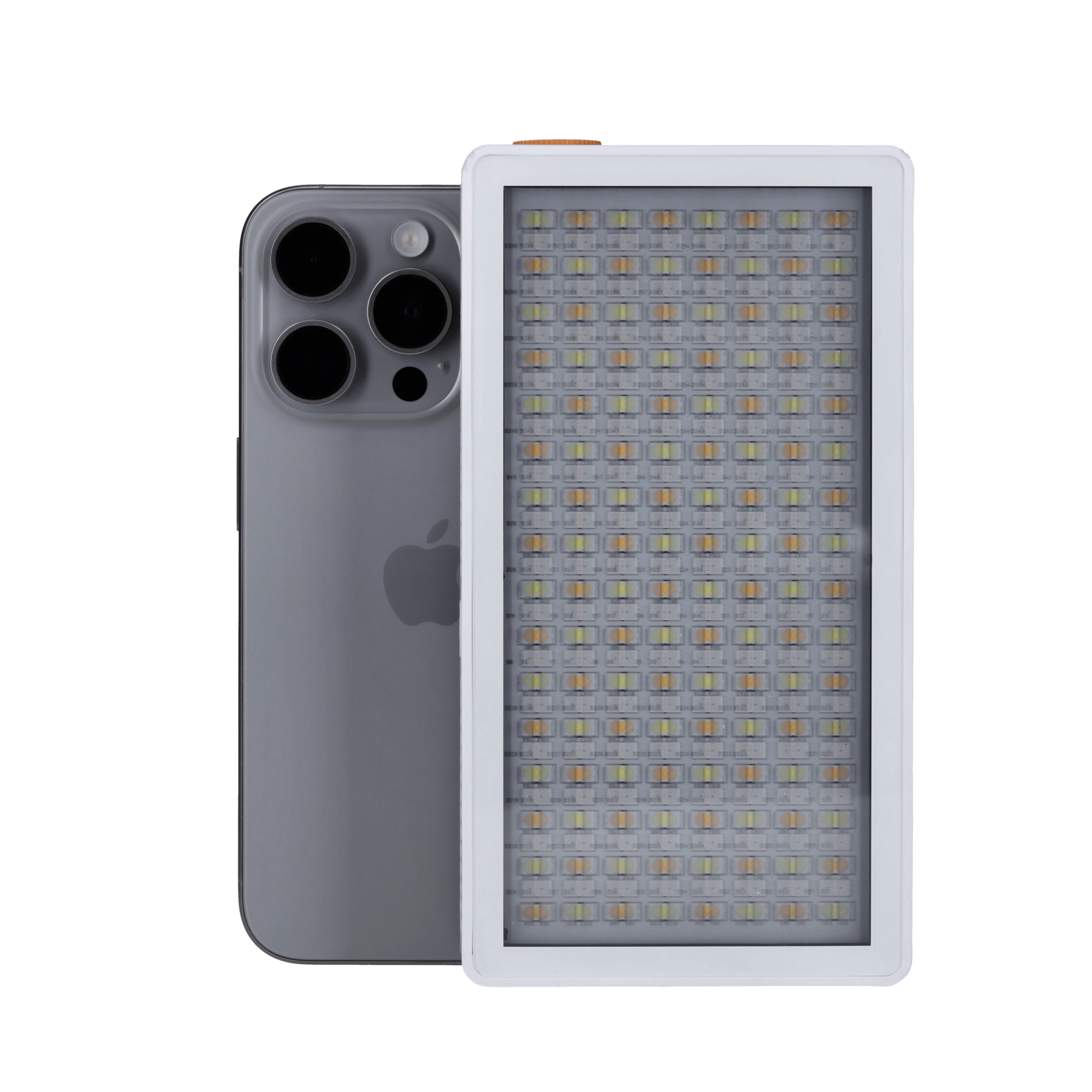 Ein graues iPhone neben einer weißen Lichttafel. Das Panel hat viele kleine Lichter.