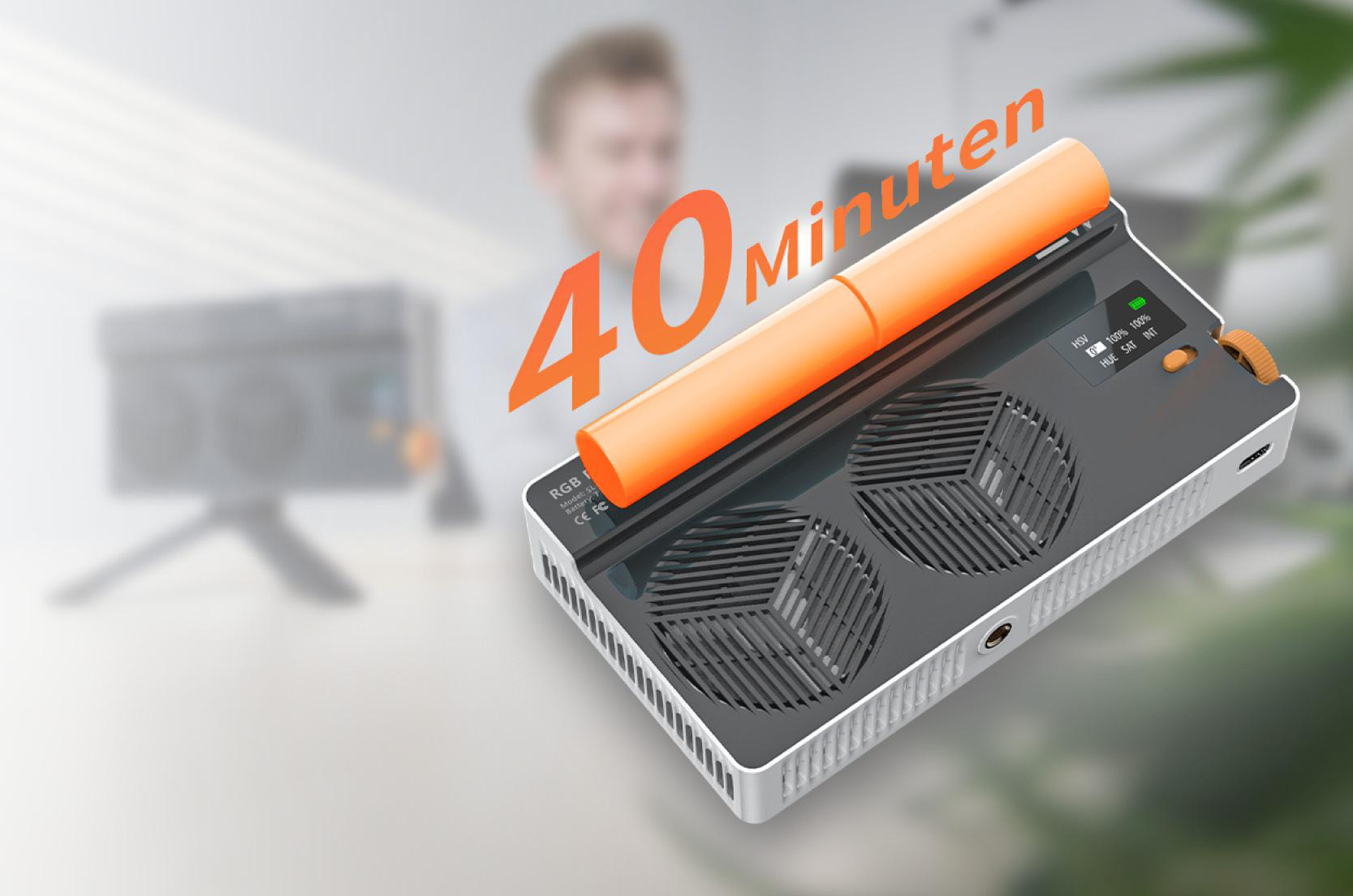 Ein Licht mit einem Rad und zwei Ventilatoren. Der Text '40 Minuten' ist überlagert. Im Hintergrund ist eine verschwommene Person.