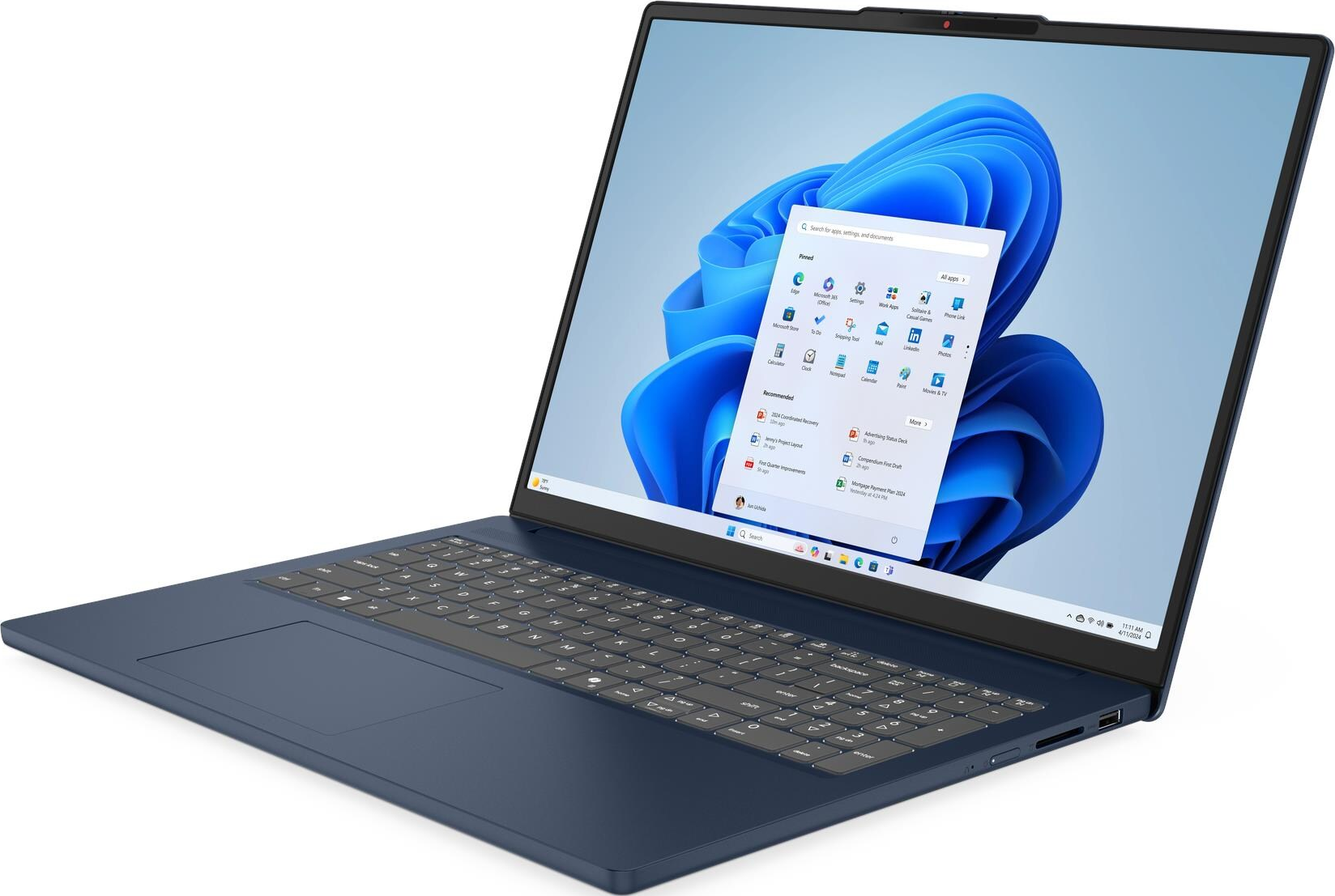 Ordinateur portable bleu affichant l'interface Windows 11. L'écran montre des icônes d'applications et une barre de recherche. Clavier et pavé tactile visibles.