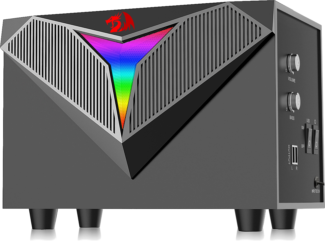 Czarny głośnik z kolorowym wyświetlaczem LED. Posiada regulację głośności i basów, przyciski zasilania i port wyjściowy.