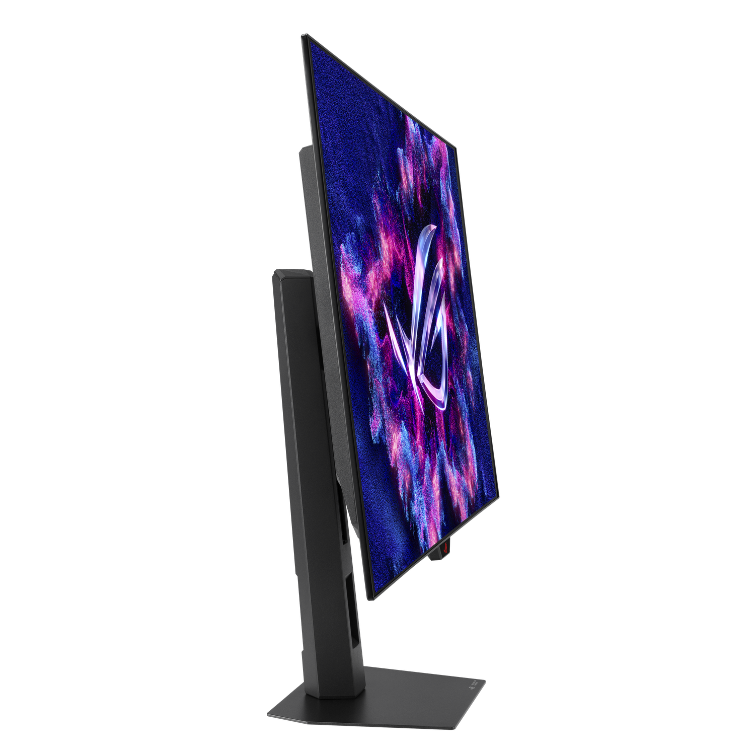 Un moniteur noir avec un affichage coloré avec le logo ROG. Le moniteur est sur un support noir sur fond noir.
