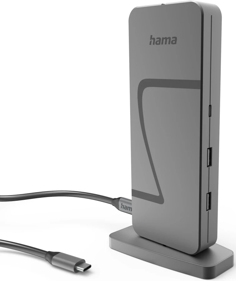 Un hub USB gris Hama avec un câble et un connecteur USB-C, posé sur une surface blanche. Le hub a des ports USB.