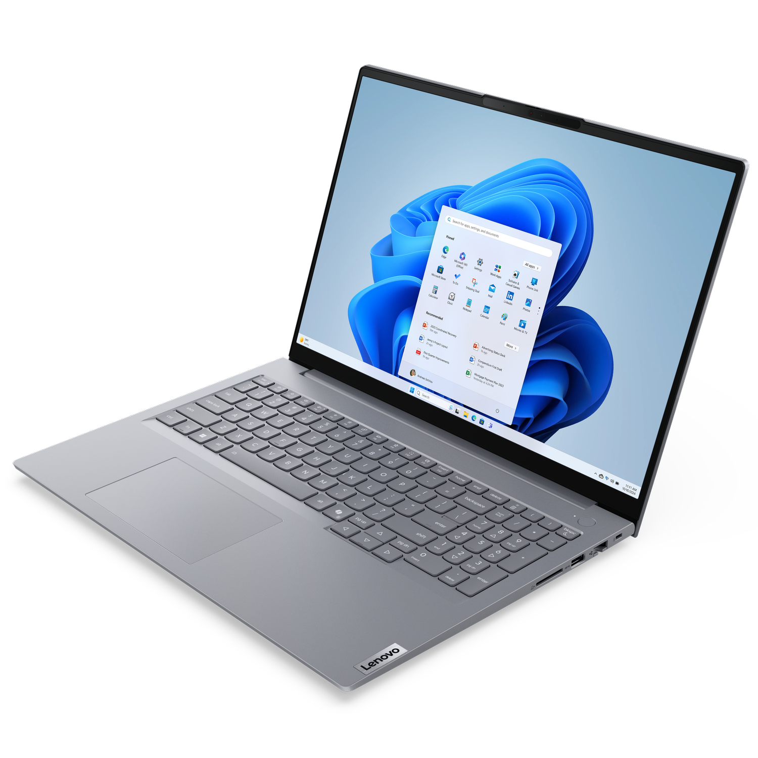 Laptop Lenovo wyświetla interfejs Windows 11. Ekran pokazuje ikony aplikacji i niebieskie tło. Laptop jest szary.
