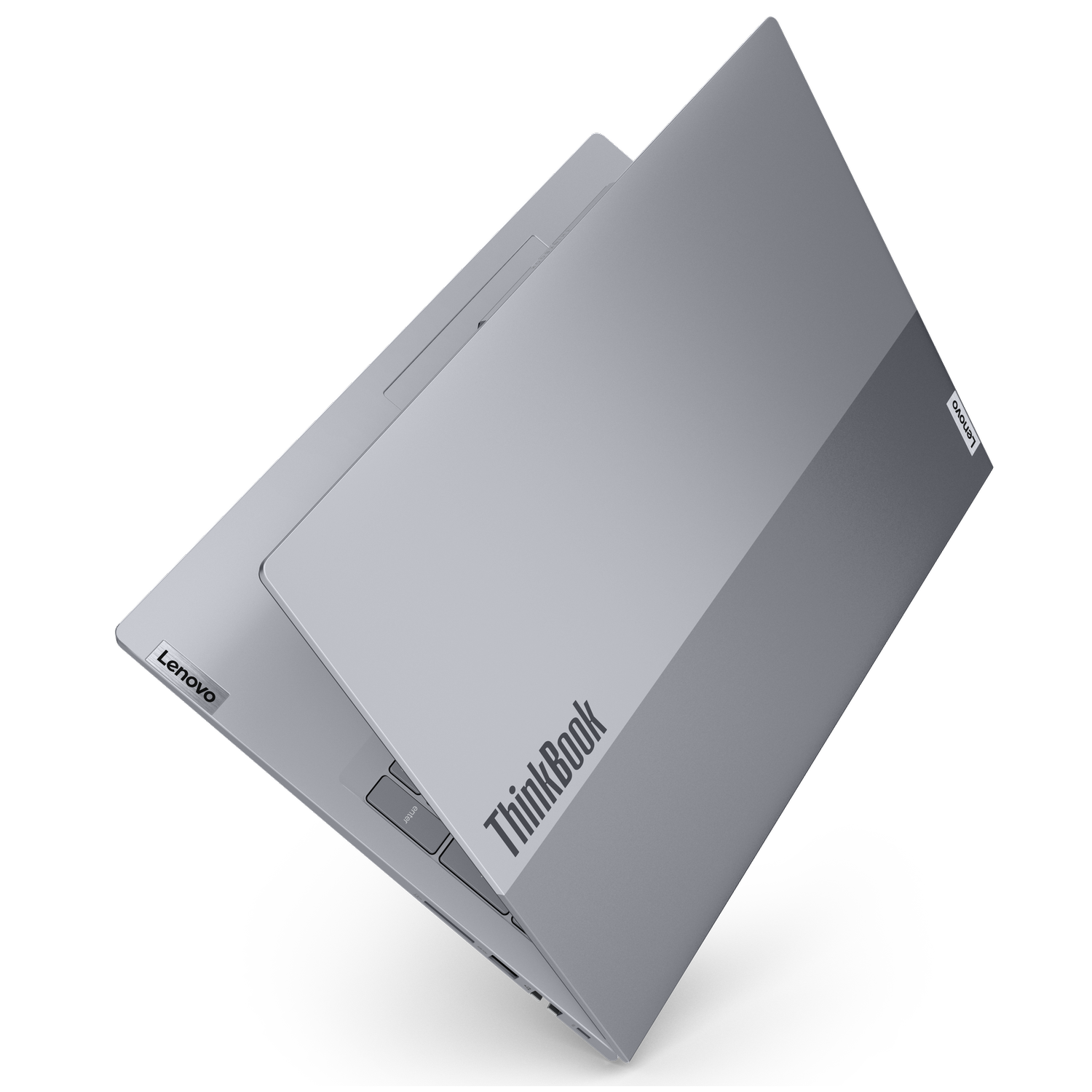 Szary laptop Lenovo ThinkBook jest lekko otwarty na czarnym tle. Widoczne są logo Lenovo i ThinkBook.