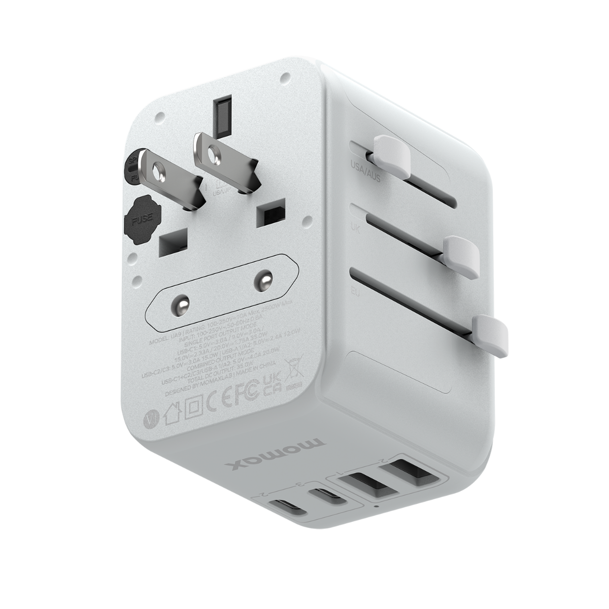 ABD/AUS, İngiltere ve AB dahil olmak üzere çoklu fiş seçeneklerine sahip beyaz bir seyahat adaptörü. USB bağlantı noktaları ve bir sigorta vardır.