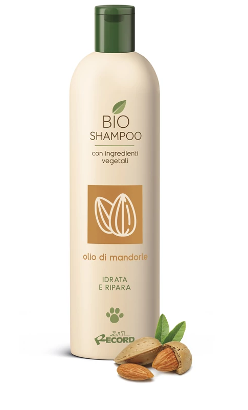 Zöld kupakkal ellátott samponos flakon. 'BIO SHAMPOO' felirat és mandulás logó látható rajta. Mandulák és levelek vannak előtte.