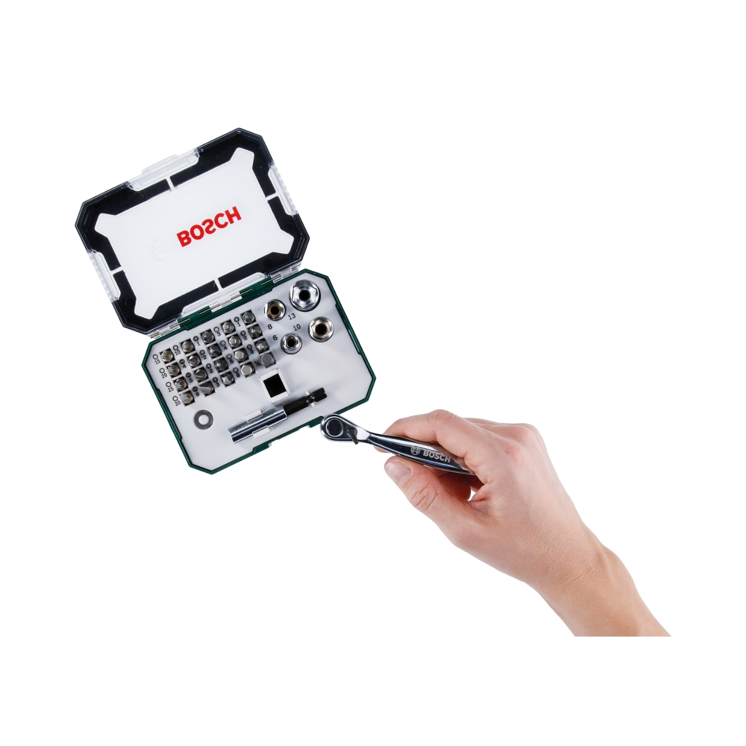 Una mano tiene una chiave inglese, con una cassetta degli attrezzi contenente punte. La cassetta degli attrezzi è aperta e il logo Bosch è visibile.