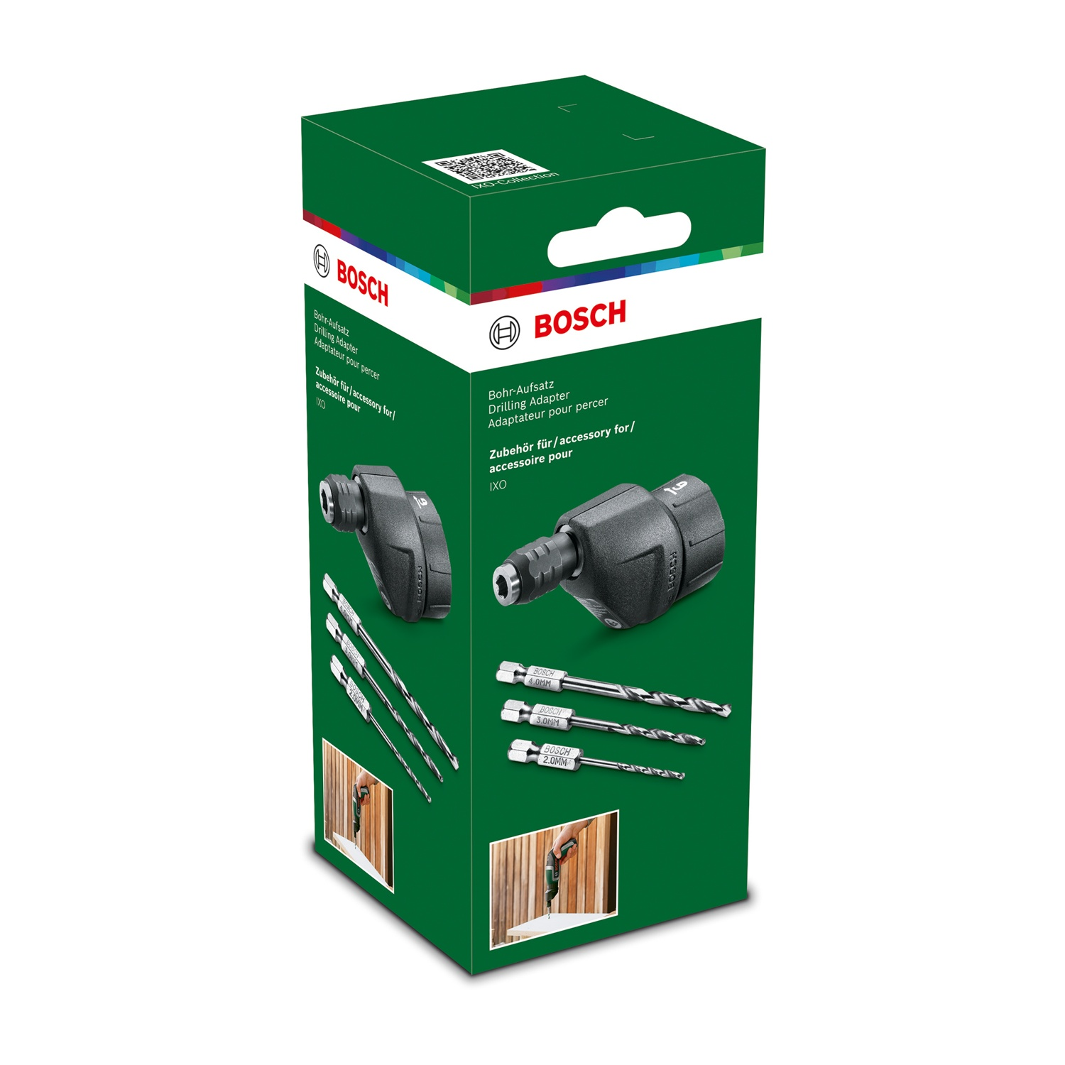 Una scatola adattatore per trapano Bosch. La scatola è verde e bianca con il logo Bosch. Sono visibili punte da trapano e un accessorio per trapano.