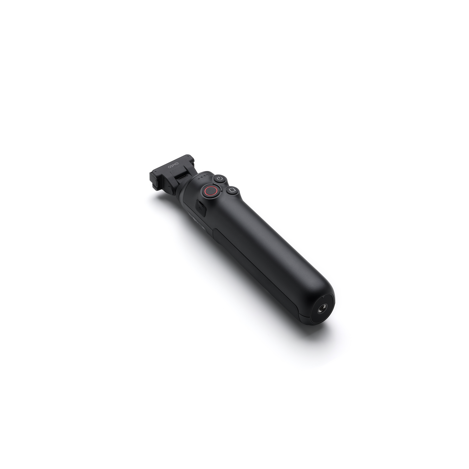 A black handheld camera stabilizer lies diagonally on a white background. It has buttons and a red record button.
