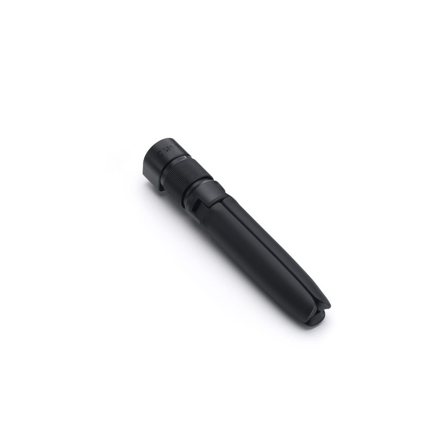 A black Osmo mobile tripod lies on a white surface. The tripod is compact and folded, with a textured handle.