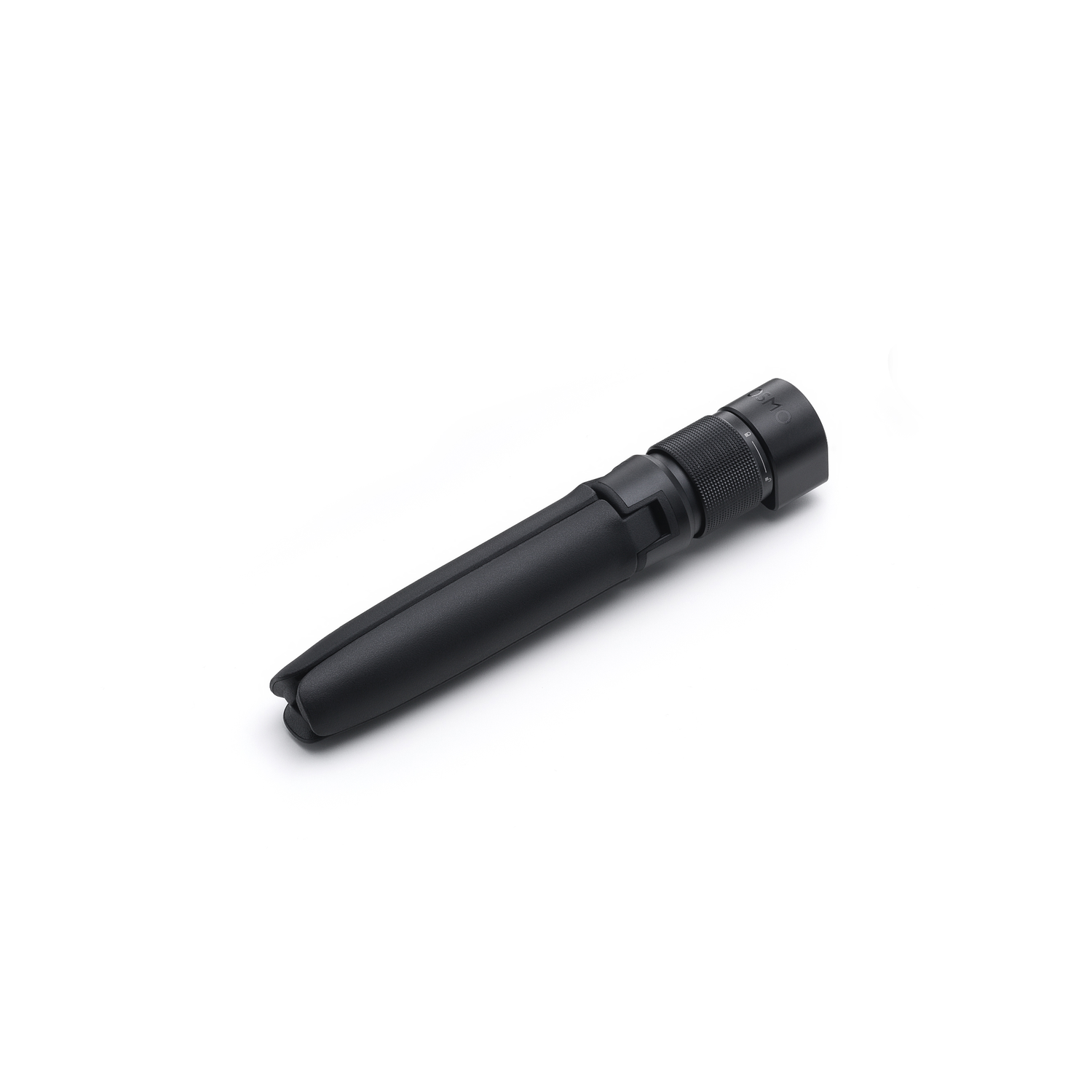 A black Osmo tripod lies diagonally on a white background. It has a cylindrical body with a textured grip and a foldable base.
