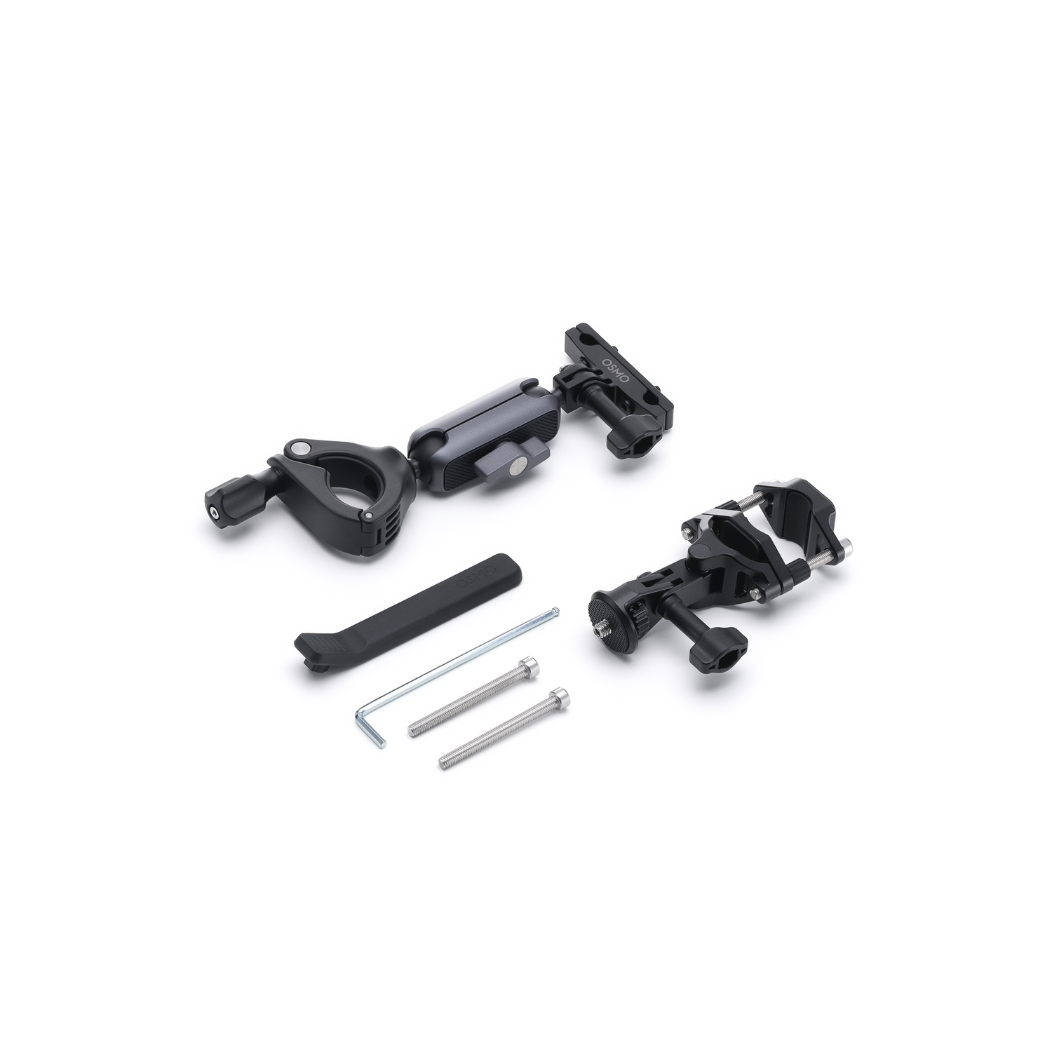 Various black and gray camera mounting accessories are laid out on a white surface. Includes clamps, screws, and an Allen wrench.