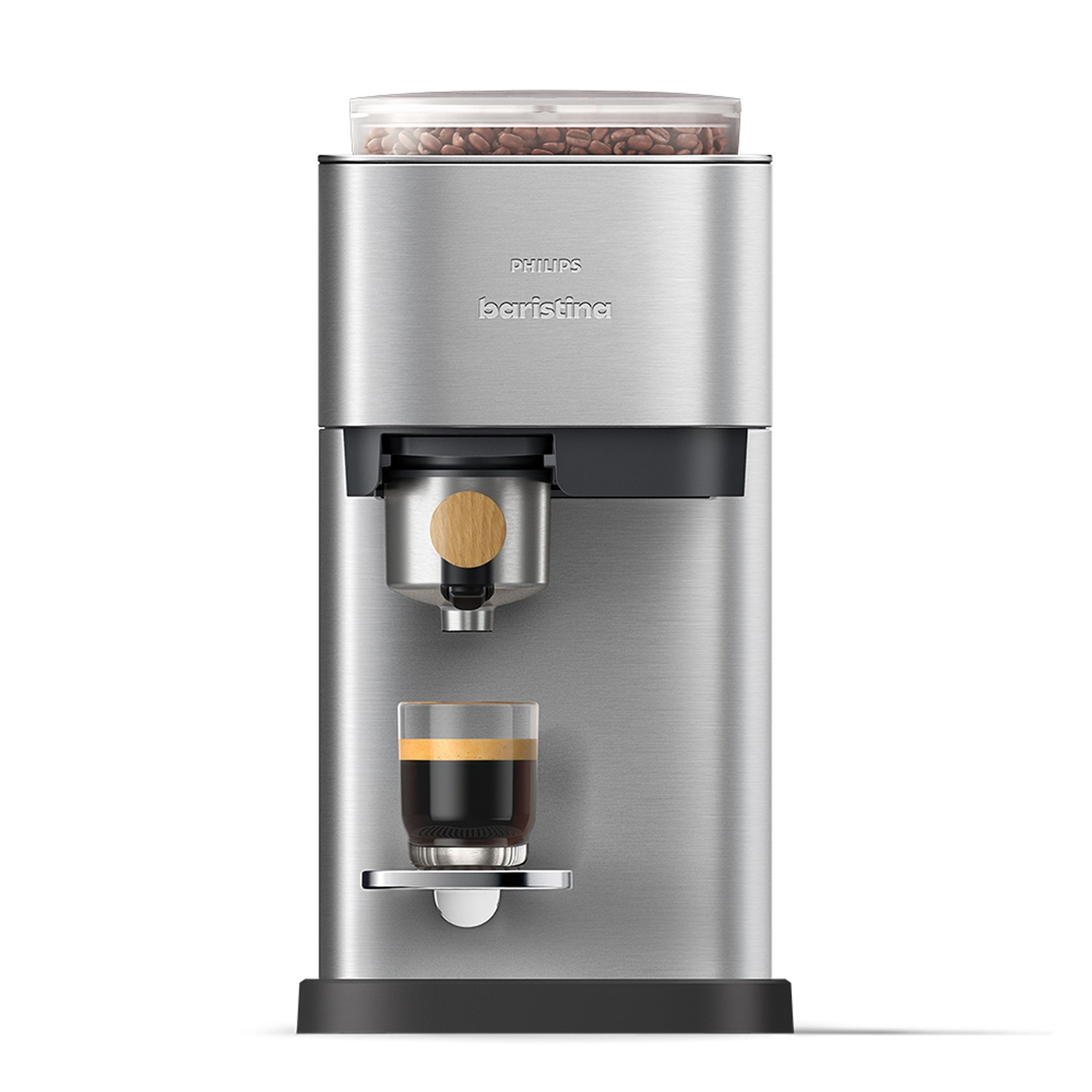 Une machine à café Philips Baristina argentée avec un verre de café. Grains de café dans un récipient transparent.