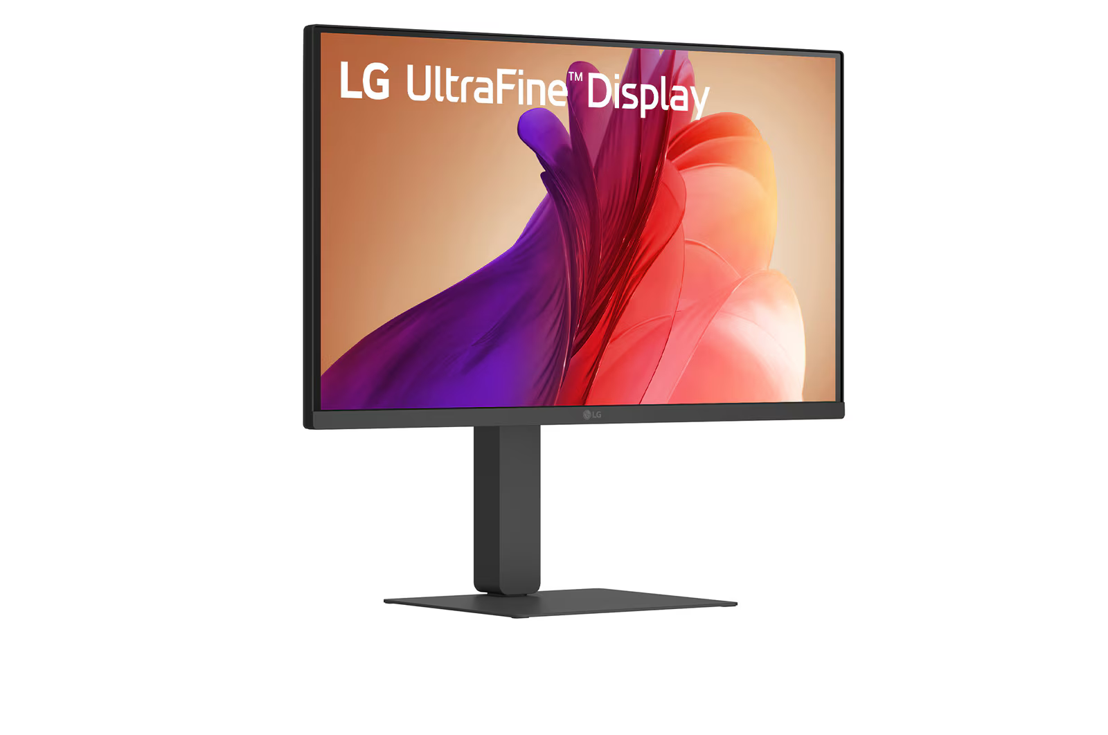 LG UltraFine Display monitor fehér háttérrel. A képernyő színes absztrakt dizájnt mutat. Az állvány fekete.