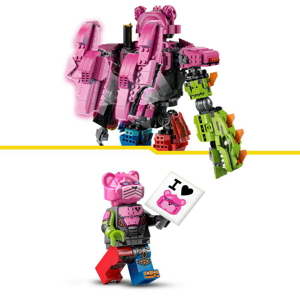 Ein pinkfarbener und grüner Lego-Roboter mit einer Lego-Figur, die eine "Ich liebe"-Karte hält. Der Roboter ist komplex mit mehreren Teilen.