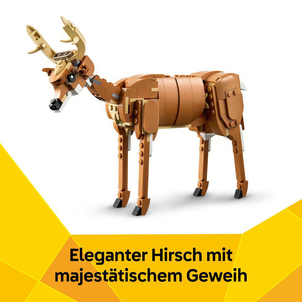 Ein braunes Hirschmodell aus Lego-Steinen mit großen Geweihen, das auf einer weißen Oberfläche steht, mit Text darunter.