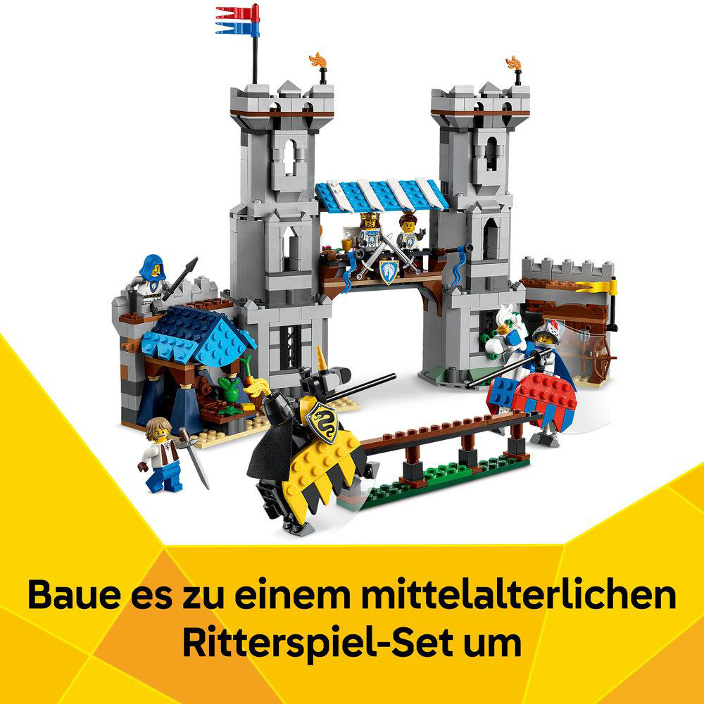 Ein Lego-Burgset mit Rittern und einer Zugbrücke, mit einem schwarzen Ritter im Vordergrund. Oben auf der Burg befindet sich ein Banner.