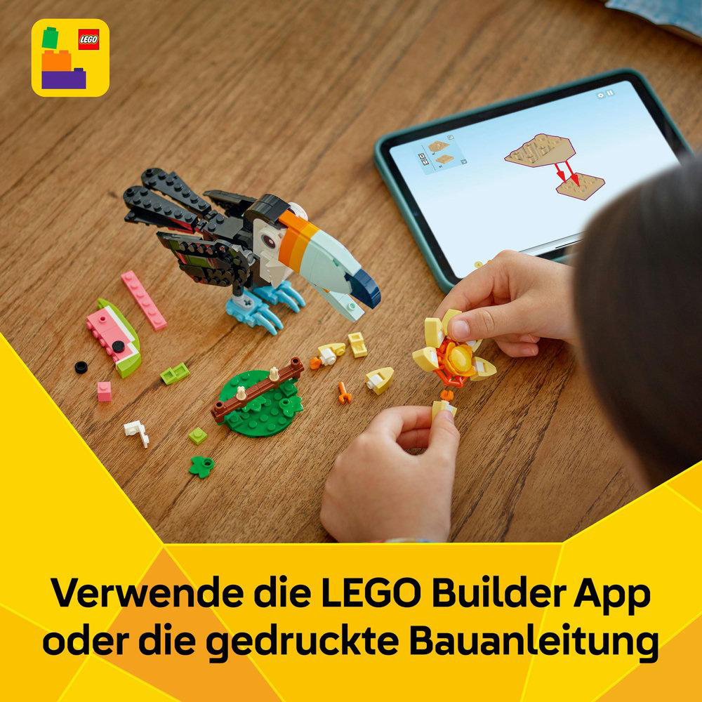 Kind baut LEGO-Tukan mit Tablet und Steinen. LEGO-Logo sichtbar. Text: 'Verwende die LEGO Builder App oder gedruckte Bauanleitung'.