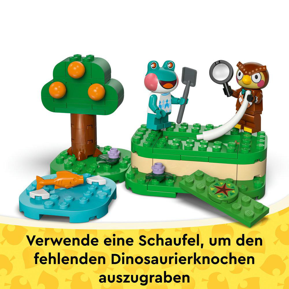Lego-Szene mit Baum, Fisch, Frosch mit Schaufel und Eule mit Lupe. Grüne, blaue und orangefarbene Lego-Steine.