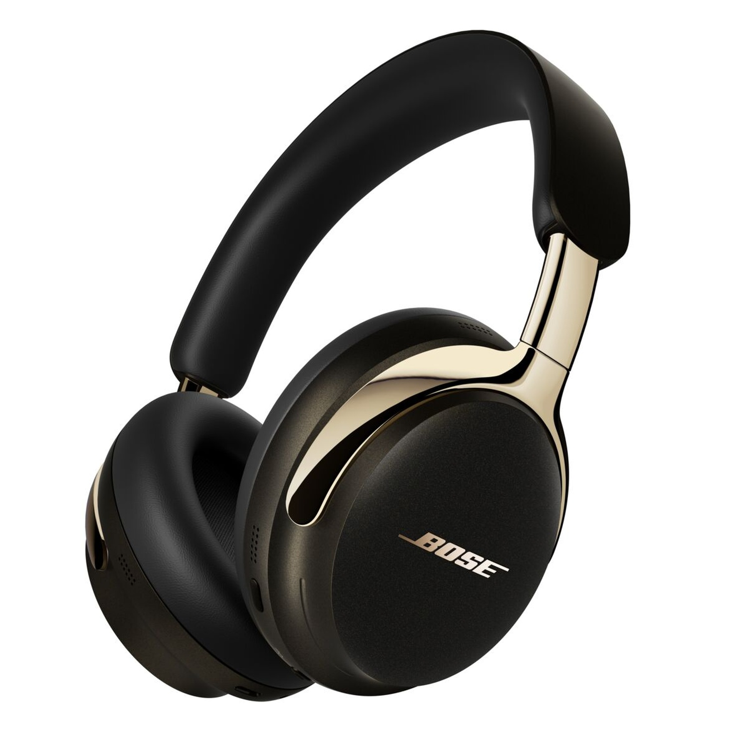 Casque Bose noir et doré sur fond blanc. Le casque a un bandeau et des oreillettes rembourrés.